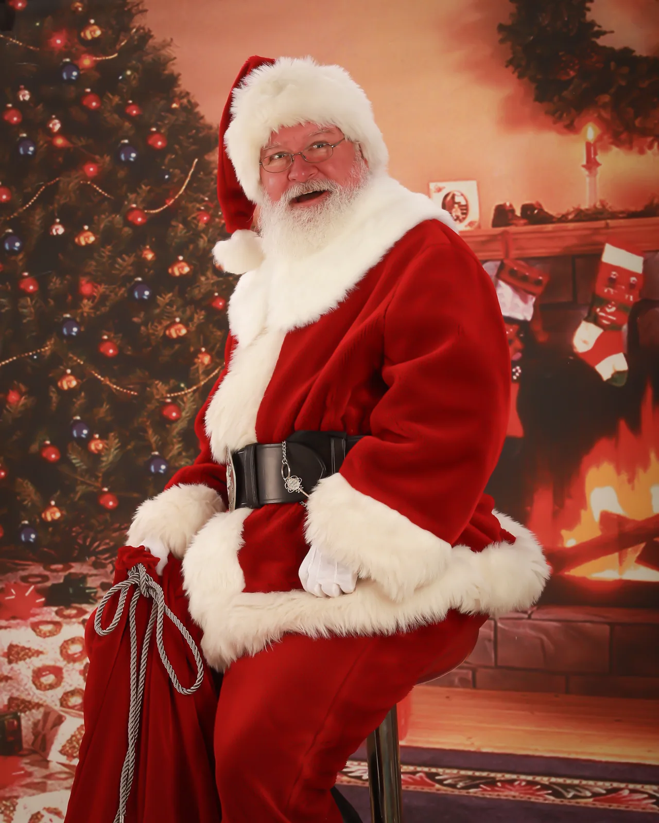 Santa Marc in his traditional red Santa suit