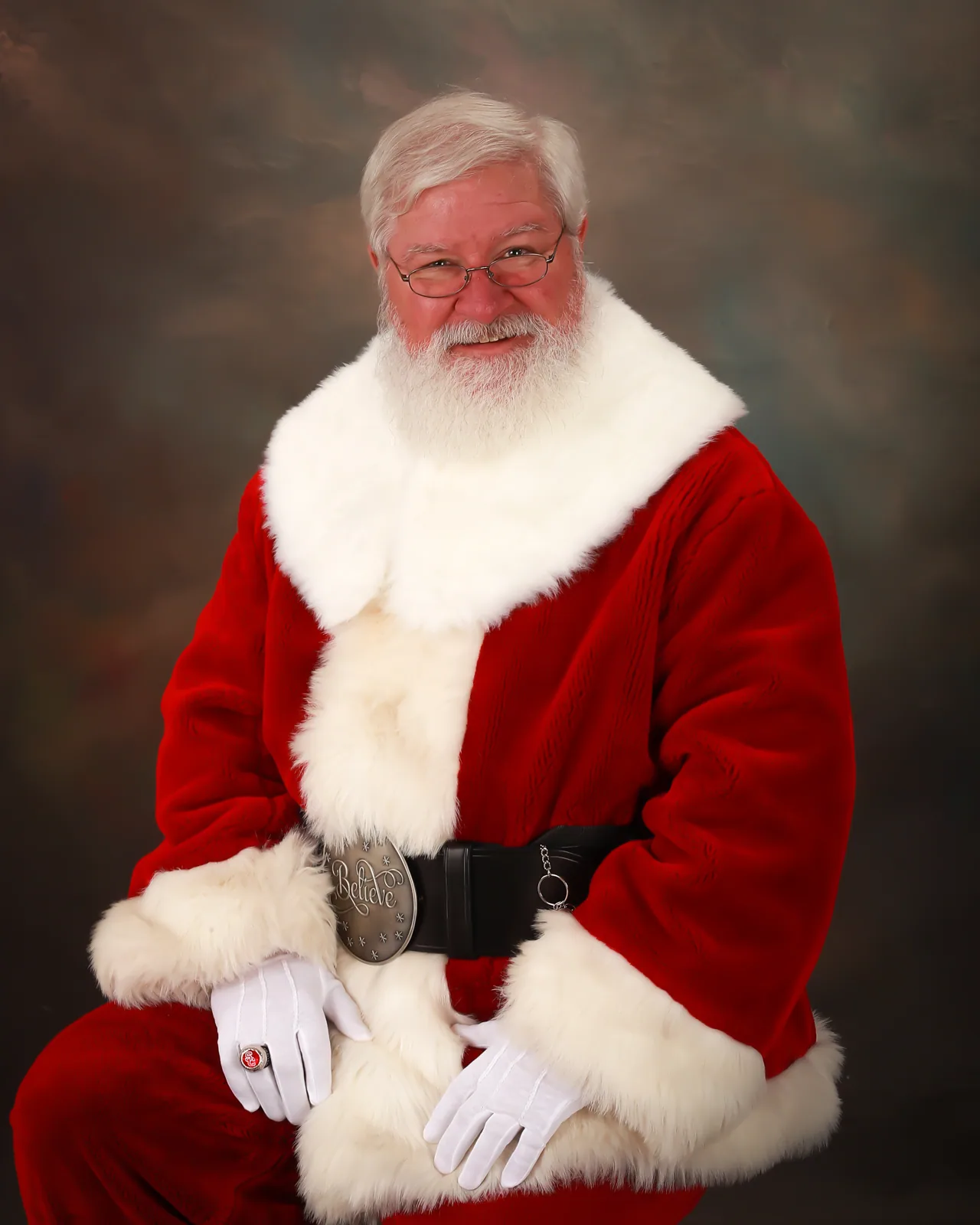 Santa Marc in his classic Christmas suit